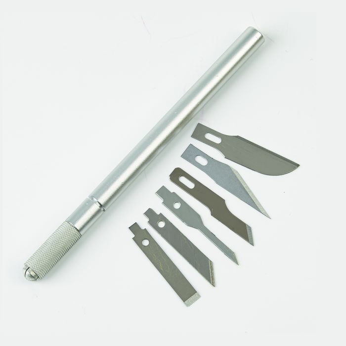 Scalpel Set with 6 Different Blades. Per set Scalpel Set with 6 Different Blades. Per set